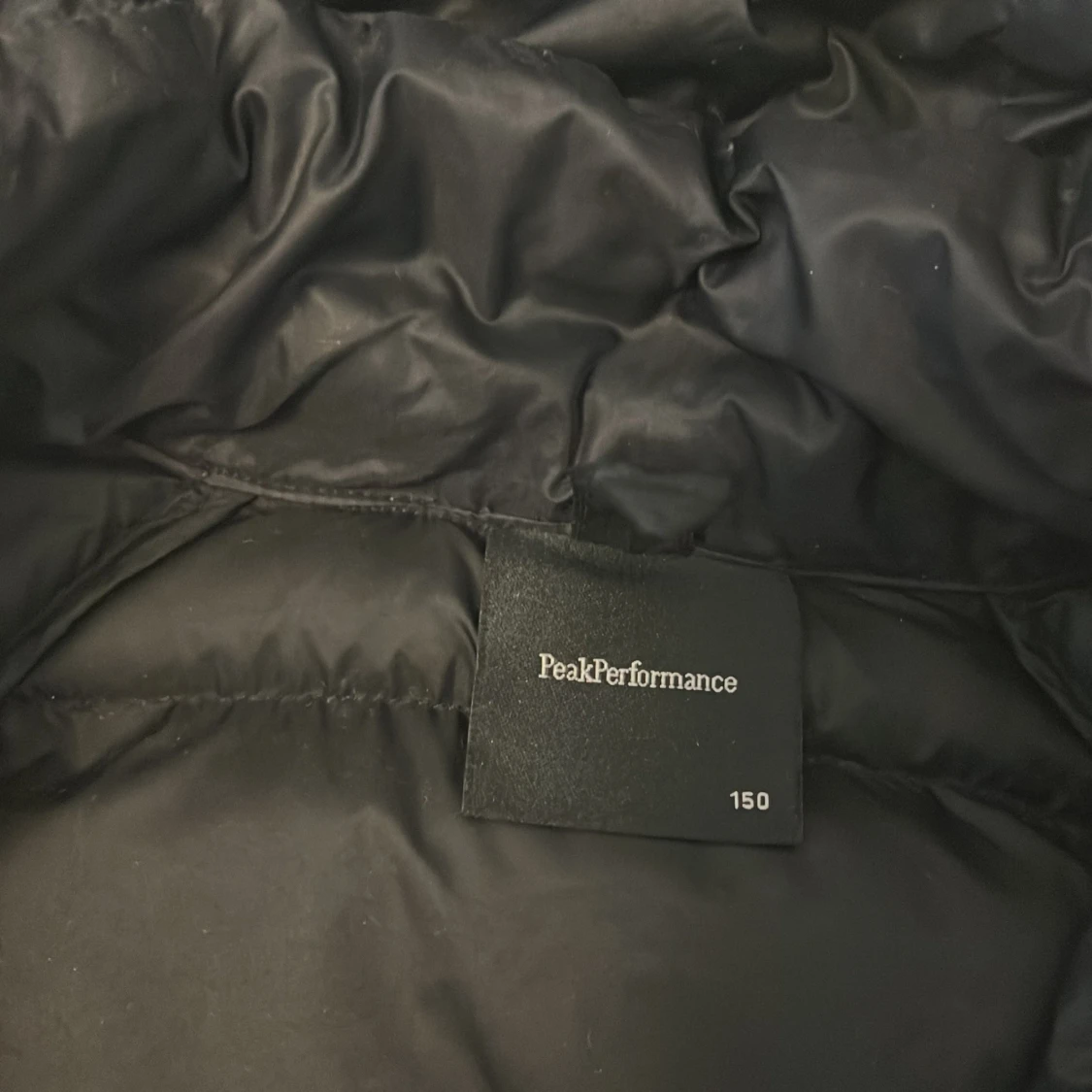Svart dunjacka Peak Performance 150 - 1