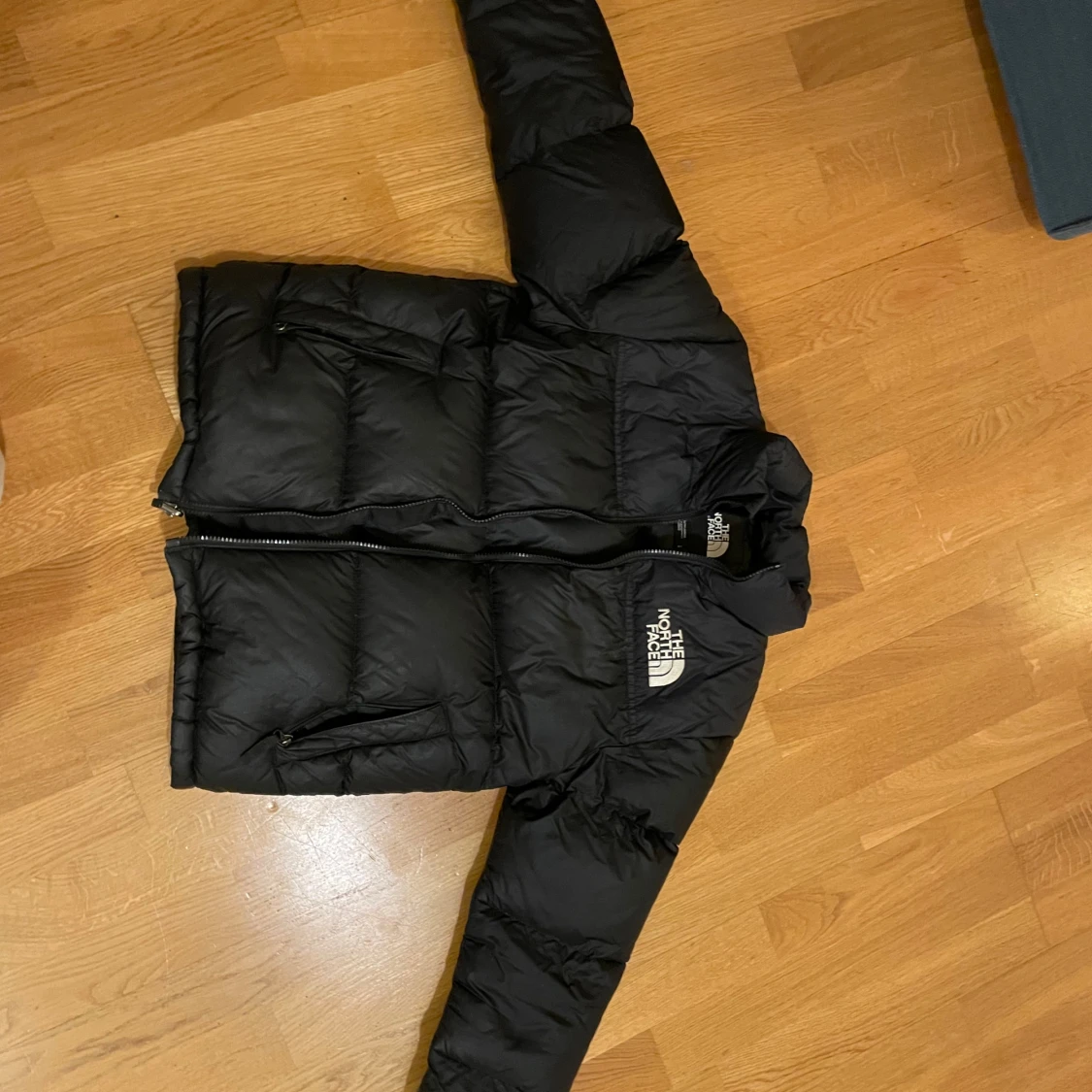 Svart pufferjacka från The North Face