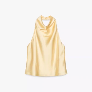 Satintopp med halterneck - Snygg gul satintopp med halterneck som är köpt ifrån Zara🩷Använt ett fåtal gånger så den är i ett mycket bra skick!! Toppen är i modellen ”Glättad topp med halterneck”😊