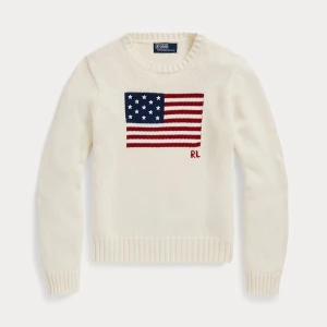 Vit Ralph Lauren kofta. Amerikanska flaggan  - Vit stickad tröja från Ralph Lauren med amerikansk flagga ny pris 2000. Passade mig som xxs men är igentligen stl 12.