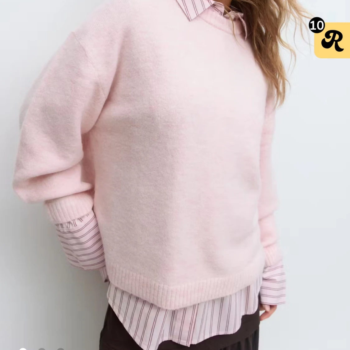 Ljusrosa stickad tröja