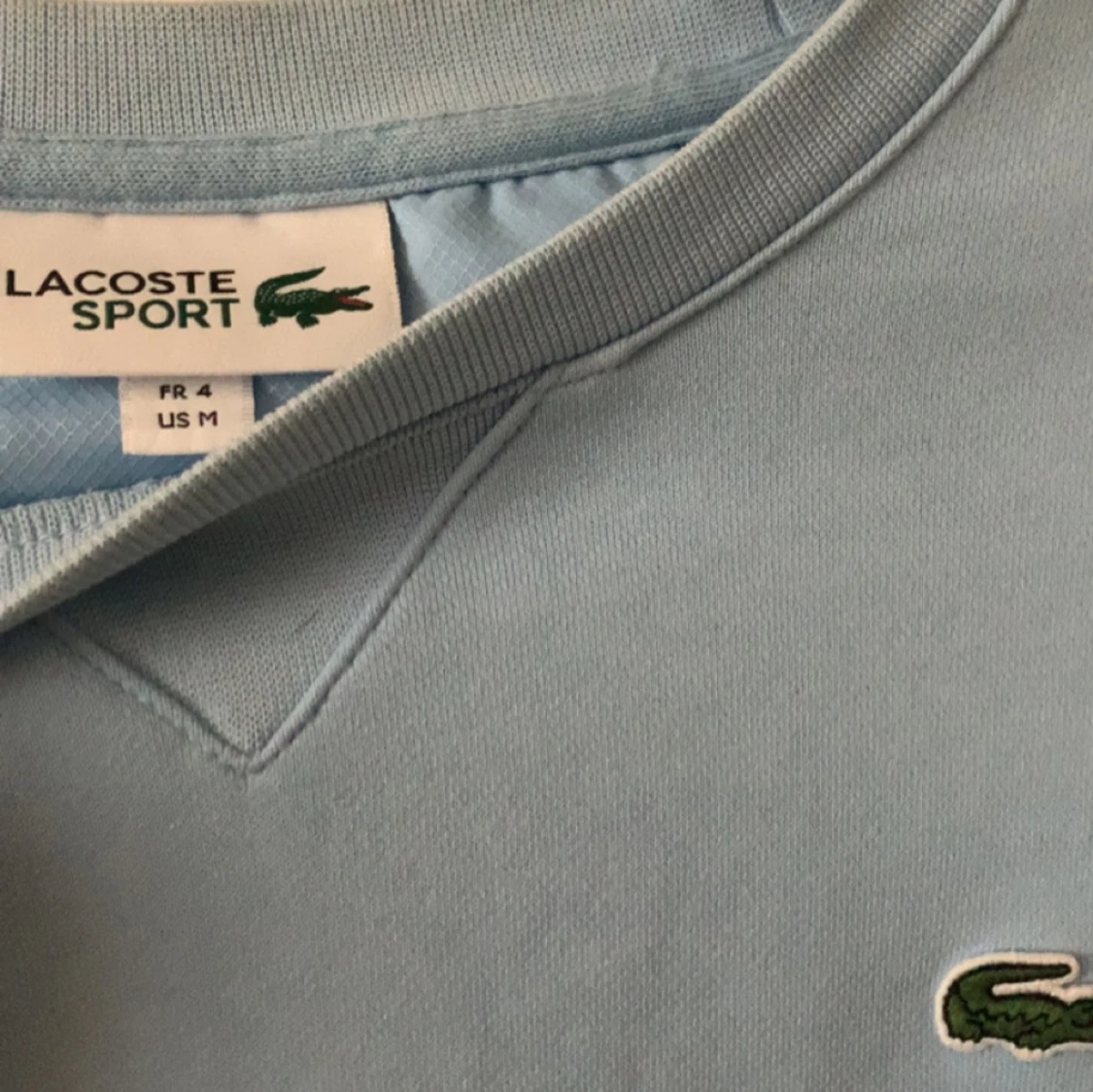 Ljusblå sweatshirt från Lacoste - 2