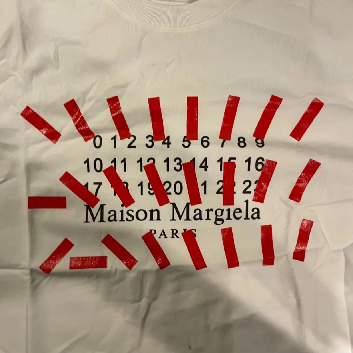 Vit t-shirt från Maison Margiela 
