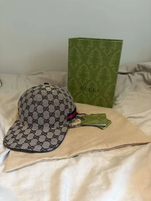 GG keps  - Helt ny GG navy keps, storlek M, Dustbag samt tags medföljer, Box medföljer ej