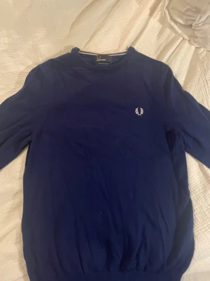 Fred Perry stickad tröja  - En snygg stickad tröja från Fred Perry i storlek S