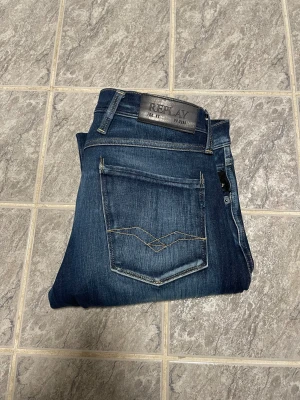 Replay Anbass Hyperflex - Ett par Replay jeans i modellen Anbass och i Hyperflex. Jeansen har en otroligt fet fade och har inga defekter alls, storlek är W29/L30. Vid frågor eller funderingar är det bara att höra av sig! Pris kan diskuteras 