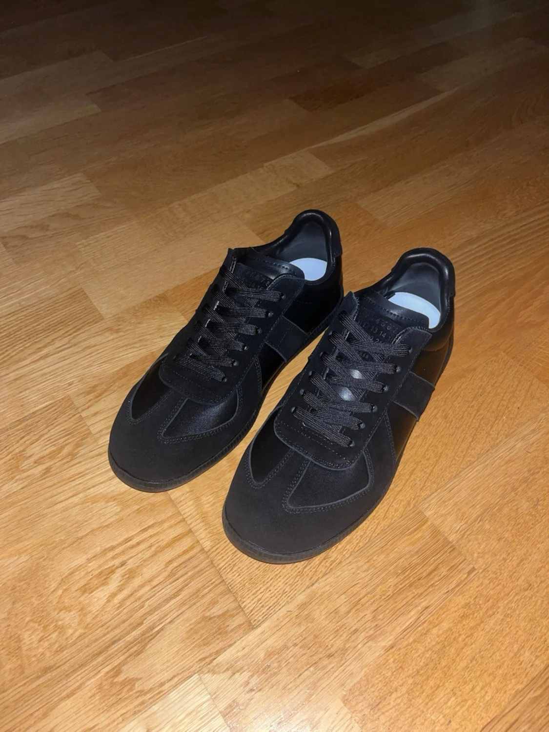 Svarta sneakers från Maison Margiela - 1
