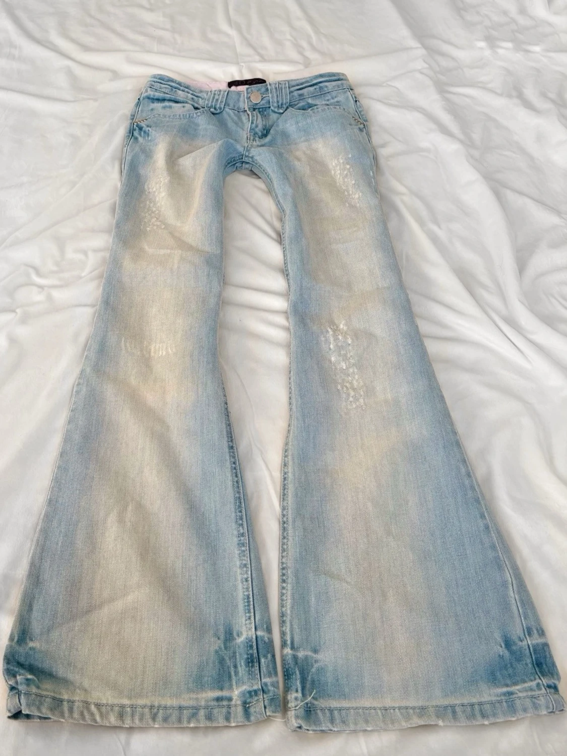Vintage ljusblå superlågmidjade bootcut jeans