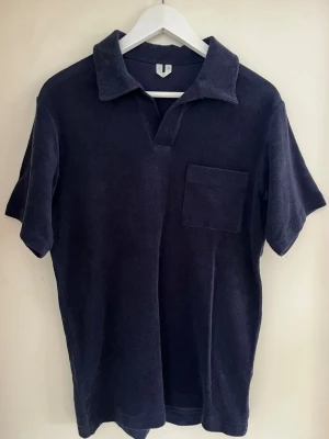 Mörkblå frottépiké från Arket - Piké från Arket