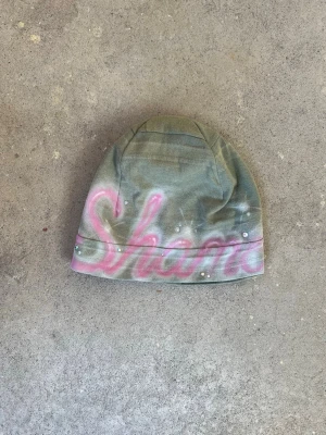 Airbrushed patchwork beanie - Sewn by us from old fabric scraps and airbrushed by Shamo