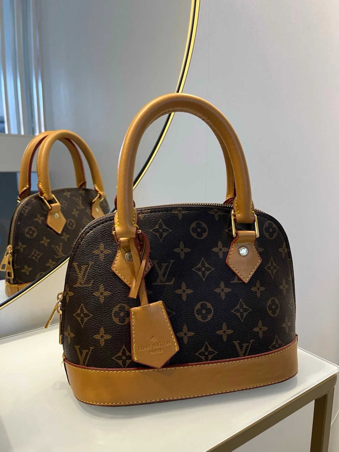 Louis Vuitton Monogram Alma handväska