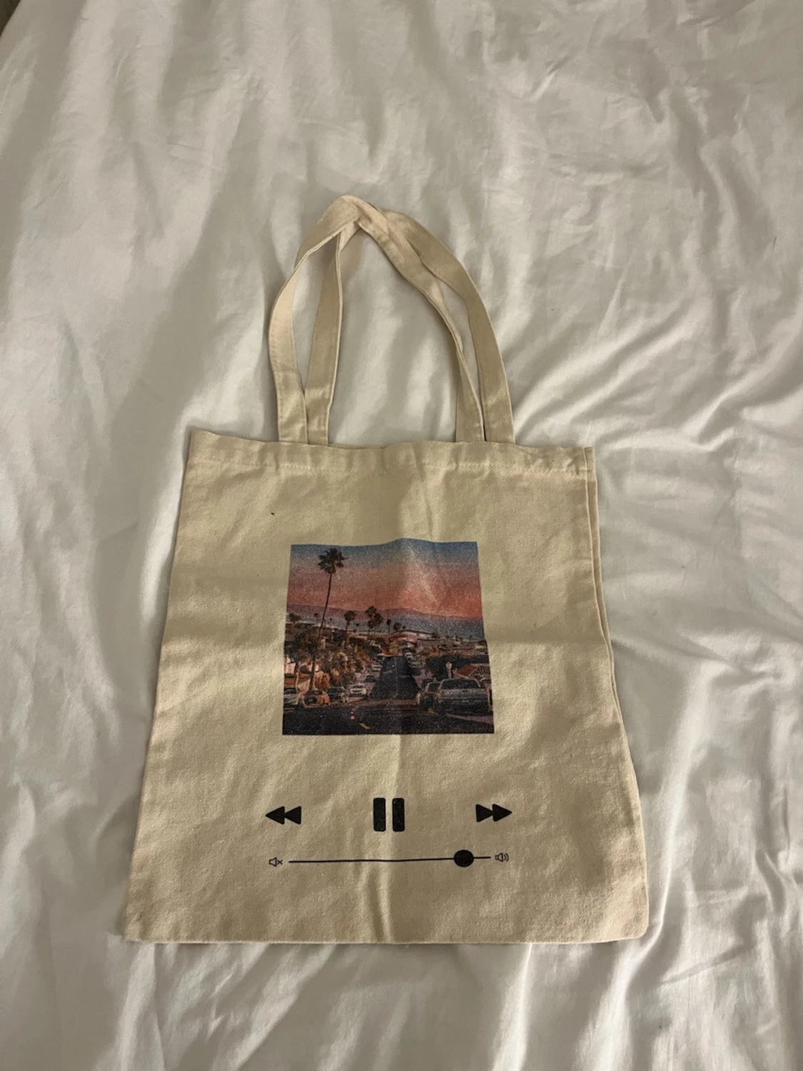 Beige tygkasse med tryck