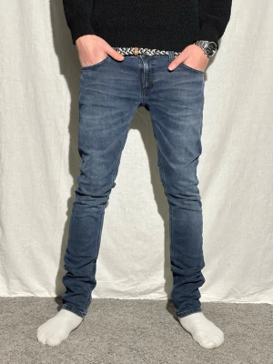 Nudie Jeans - Blåa Nudiejeans i storlek W32 L34. Hör av er vid frågor! Mvh