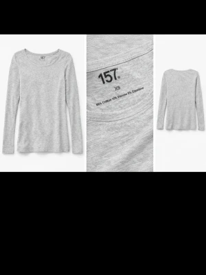 Ljusgrå långärmad topp från lager 157 - En basic ljusgrå långärmad topp från lager 157. Tillverkad i en mjuk mix av bomull, viskos och elastan som ger en skön och stretchig känsla. Perfekt att styla med jeans eller kjol för en enkel och clean look.