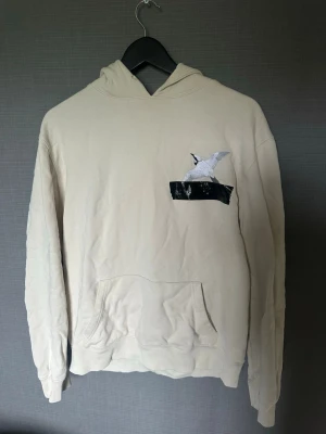 Beige hoodie från Axel Arigato - Beige hoodie från Axel Arigato