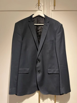 Kavaj- Tiger of Sweden - Kavaj från Tiger of Sweden. Storlek: 52