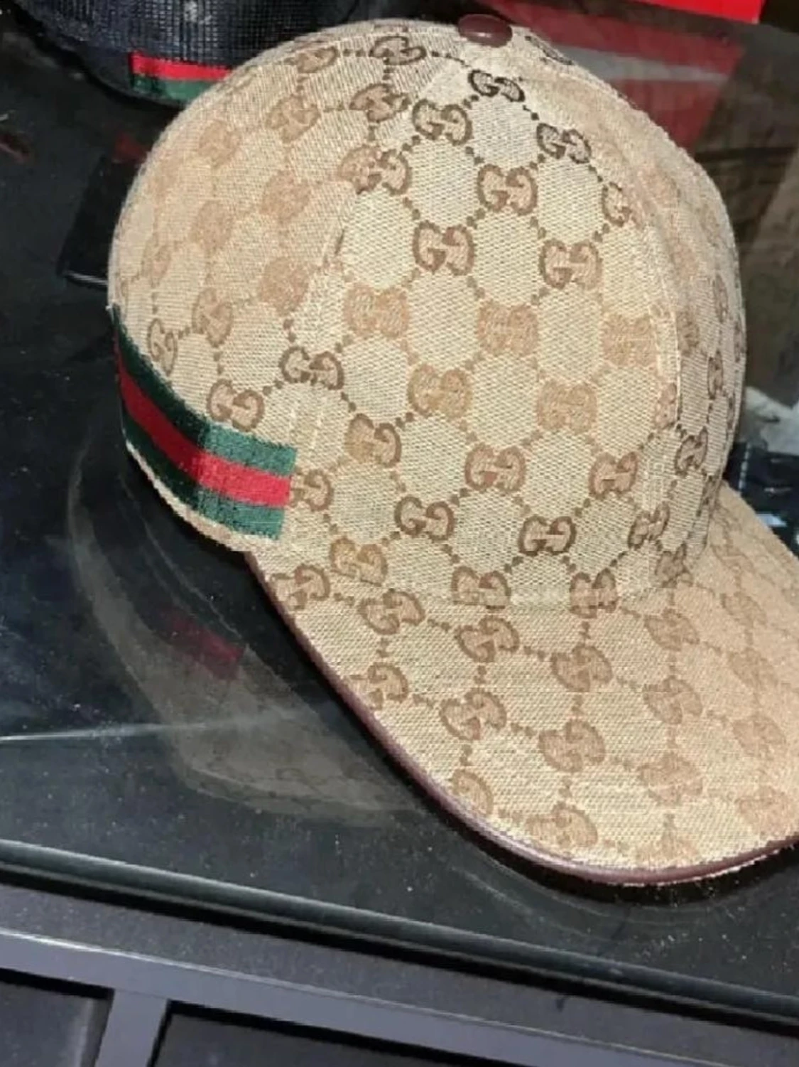 Beige keps från Gucci med GG-mönster