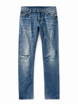 Blå slitna dondup jeans med hål - Säljer ett par blå dondup jeans med slitningar. 