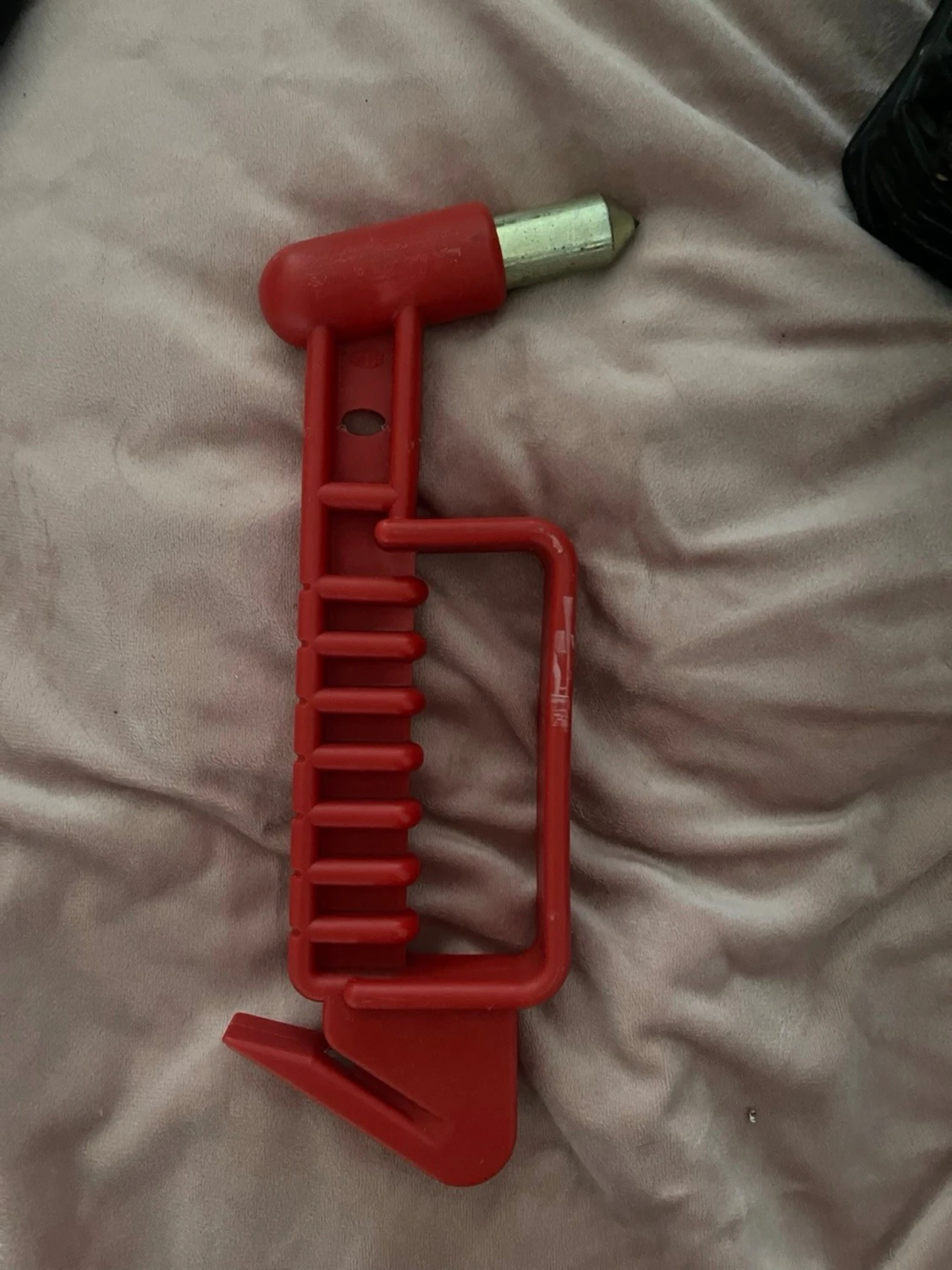 Röd portabel dörrlåsare i plast