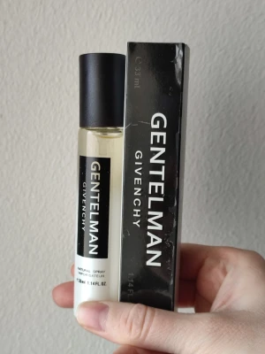 Givenchy Gentleman - Givenchy Gentleman Perfume. 33ml bottle. New! Has some flaws on the front of the box that you can see in the pictures.