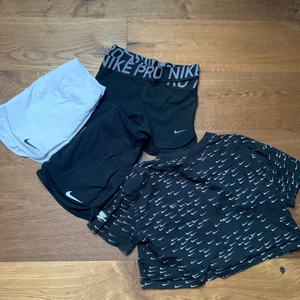 Träningskläder från Nike  - Två tennis kjolar ett par skorts och en kroppar t- shirt 