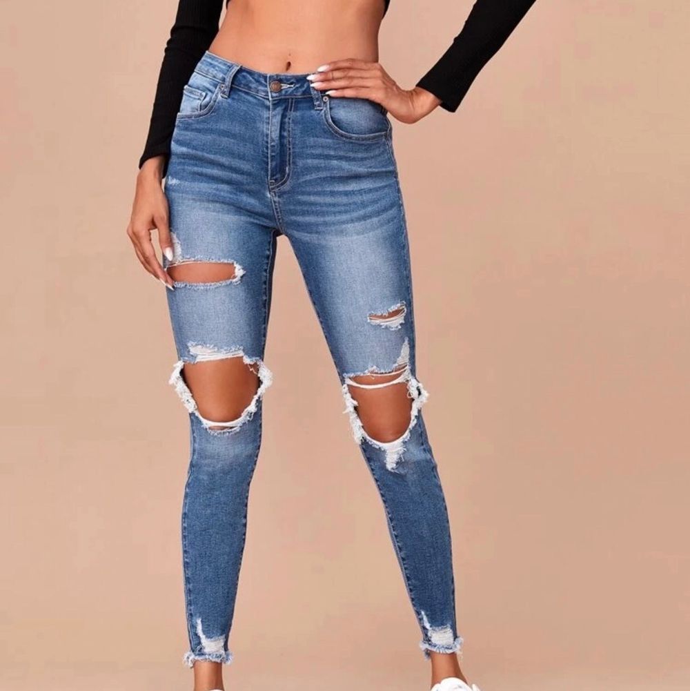 Blå skinny jeans med hål | Plick Second Hand