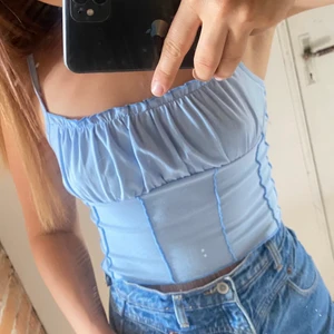 Ljusblå topp - Storlek S/M