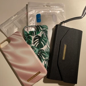 iPhone 7/8 plus skal - 2 ideal of sweden-skal & 1 plånsboksskal i nyskick från ideal of sweden (skalen i bra skick med några omärkbara repor), 3 skärmskydd på köpet 🤳🏽 allt för 100kr, köpare står för frakt 💚