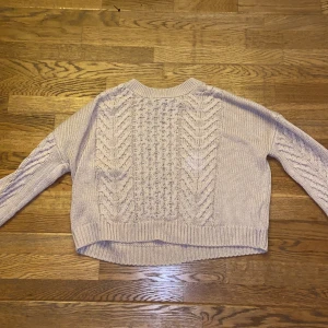 Stickad tröja H&M - Rosa stickad tröj afton H&M storlek 170 (barnavdelningen)