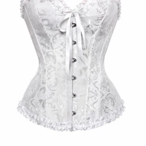 vit korsett - säljer en vit korsett, bara använd en gång och i nyskick! Storlek L men passar M!