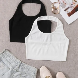 Linnen - Ett 2pack linnen i svart och vit. Använda endast 2 gånger och är i bra skick. Hör av er för intresse. 