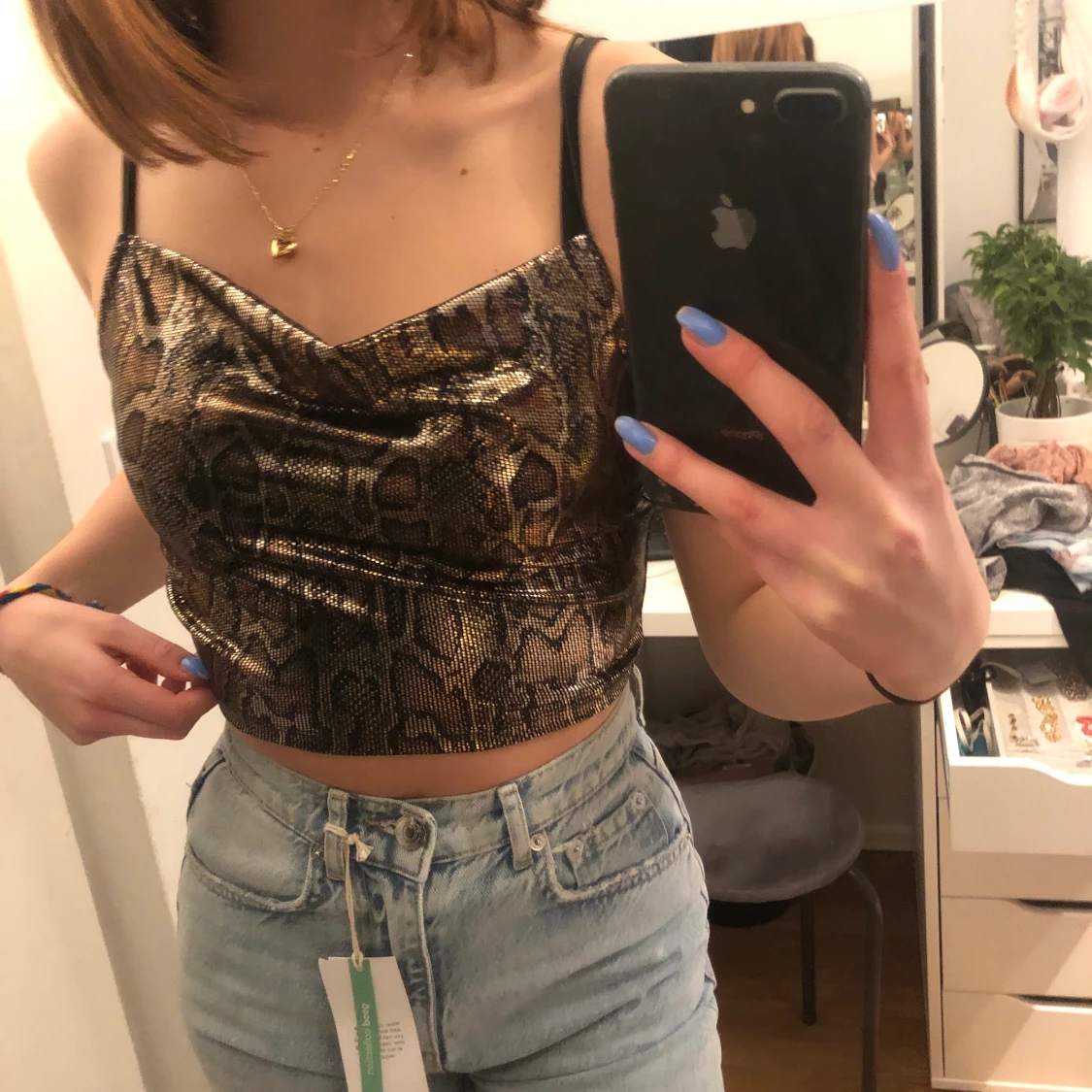 Oanvänd glittrig snakeskinlinne