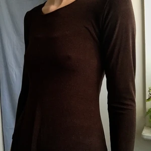 Tunn, mörkbrun, klänning XS - Tunn, något genomskinlig, brun klänning. XS