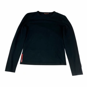 PRADA - PRADA  -Strl. S -Liten ficka vid ländryggen -Pris: 800:- 