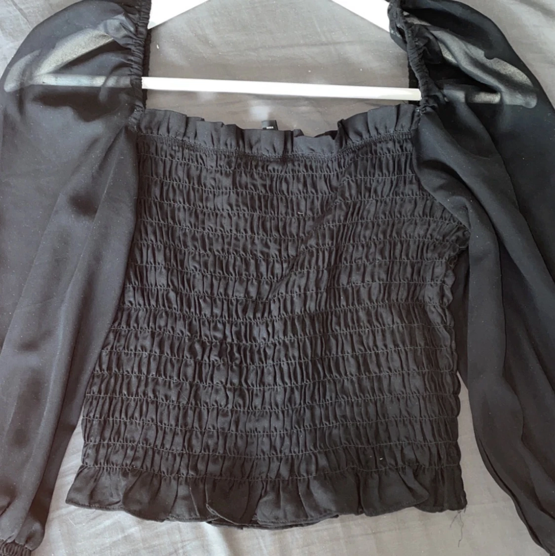 Svart blus divided, storlek eu 36 - 90