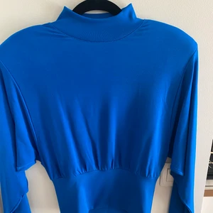 En välfinansierade topp från HM - Helt ny! 