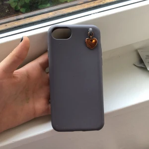 Fint skal - Grått skal med ett hjärta på