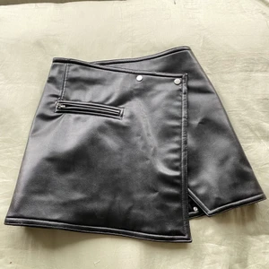 Black leather skirt - Black leather skirt from WEEKDAY. Size 36