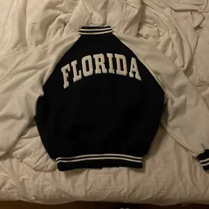 College jacka men tycket ”Florida” på ryggen skit cool o varm 