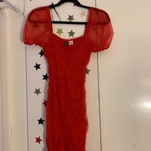 Red dress - Its really pretty and when you where it it gives you a really nice hourglass figure 