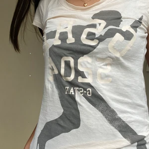 tröja - rosa beige , svart tryck 