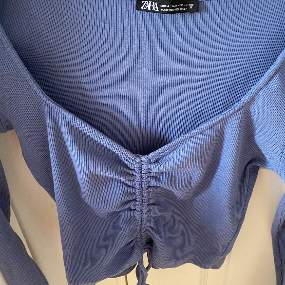 Blå topp med långa ärmar från zara - 90