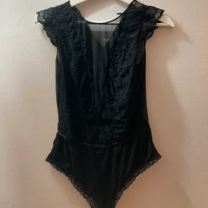 Body i spets  - Jättefin body som var populär för några år sedan. 