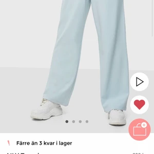 Blå kostymbyxor - Blå kostymbyxor från NElly, aldrig använda med prislapp kvar, säljes pga returtiden gick ut och är ej min stil