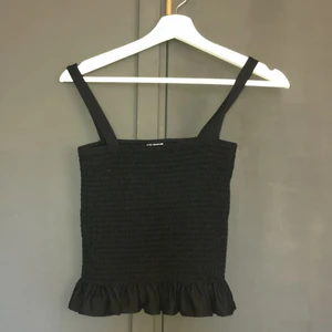 Söt topp - En svart topp från HM i storlek S 