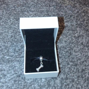 Pandora dog bone charm - Pandora dog charm new in excellent condition been in box… colour silver s925ale price paid £ 35 