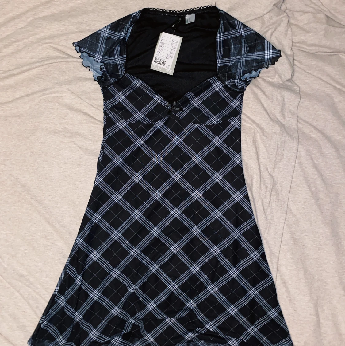 Rutig kort klänning - 90