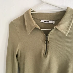 Tröja - Tajtare fin grön tröja. 