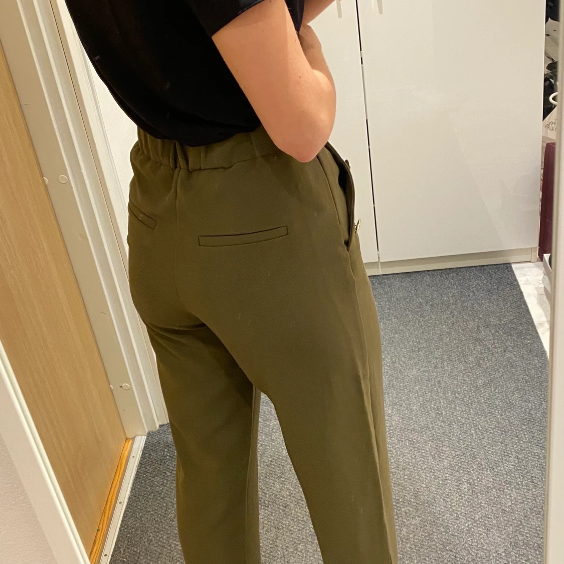 Green trousers with golden garments  - 90