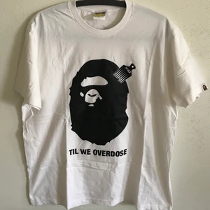 Bape x The Weeknd XO Tee - Bape / A Bathing Ape x The Weeknd XO T-Shirt  Size large, fits like a regular men’s medium. Great condition, no flaws or damage.  DM if you need exact size measurements.   Buyer pays for all shipping costs. All items sent with tracking number.   No swaps, no trades, no offers. 